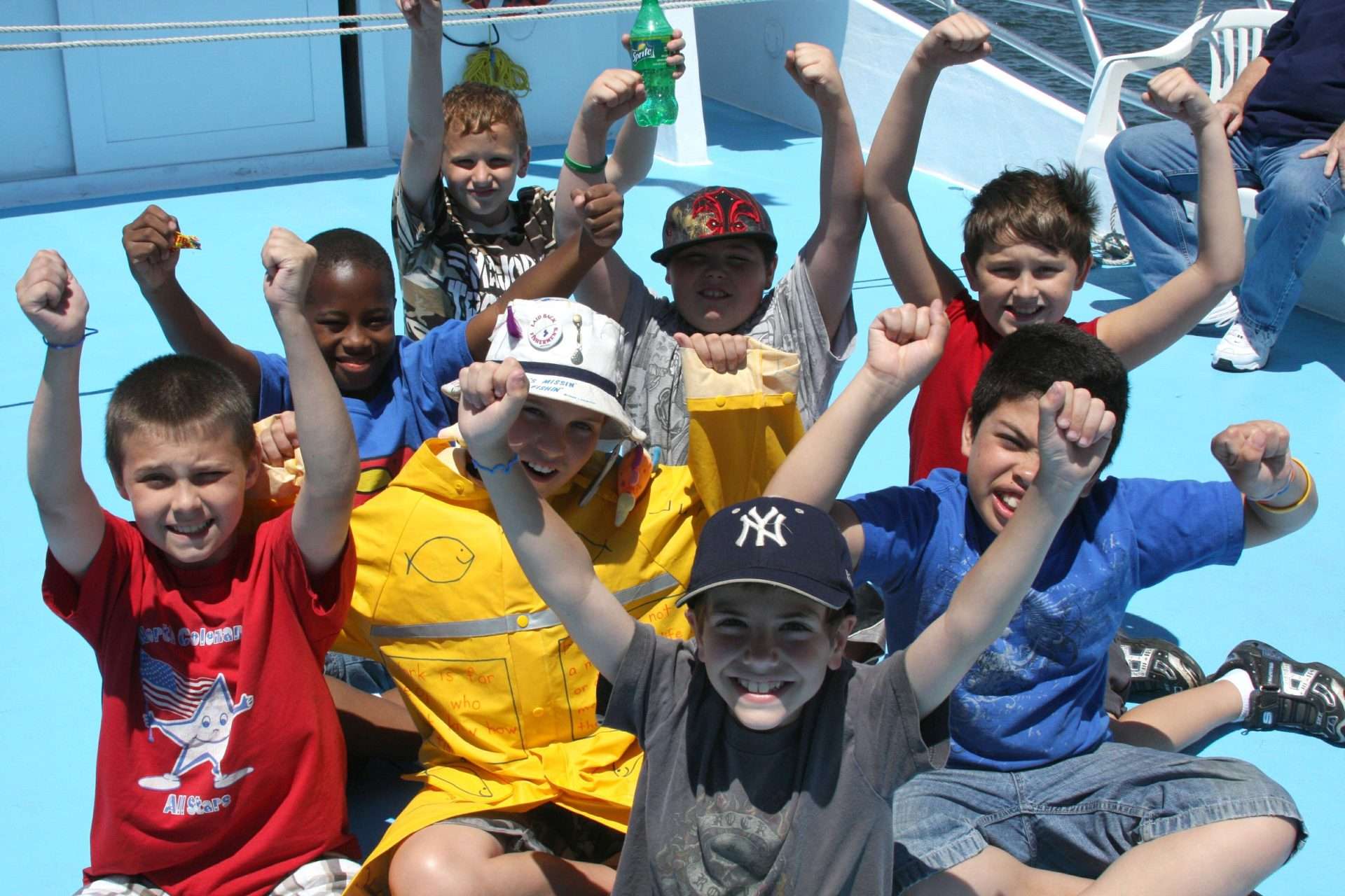 Kids cheering aboard a Celtic Quest fishing charter from Port Jefferson, Long Island